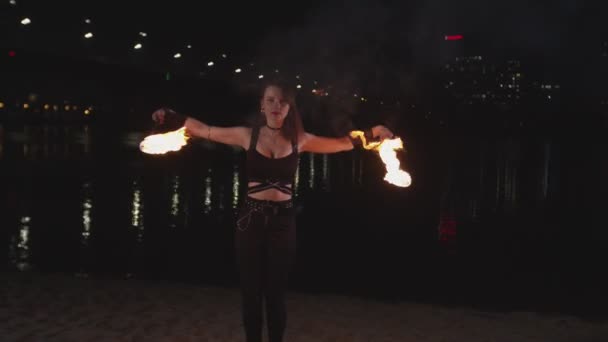 Pretty firegirl performing magic show with flame — Stock Video