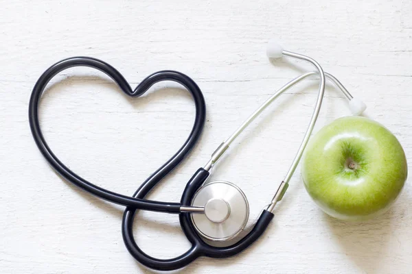 Alternativmedizin Gesundes Zeichenkonzept Mit Stethoskop Herz Und Grünem Apfel Auf — Stockfoto