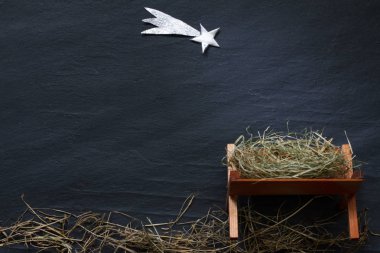 Yemlik ve star Bethlehem abstracy Noel arka plan Doğum sahnesi siyah mermer üzerinde