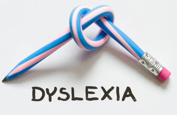 Dyslexia words and curved pencil