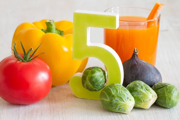 5 Five a day portion with fresh fruits and vegetables healthy diet lifestyle concept