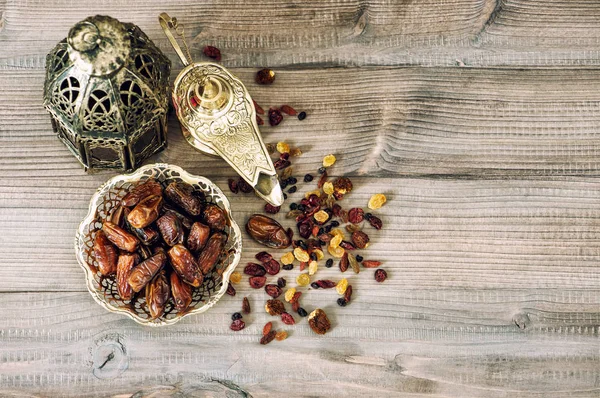 Islamic Holidays Decoration Oriental Lamp Latern Raisins Dates Wooden Background — Stock Photo, Image