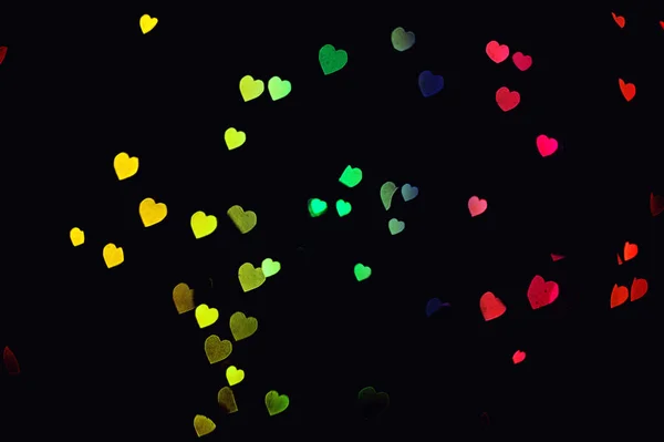 カラフルなボケ ライト ハート デコレーション 光沢のある愛の背景 — ストック写真