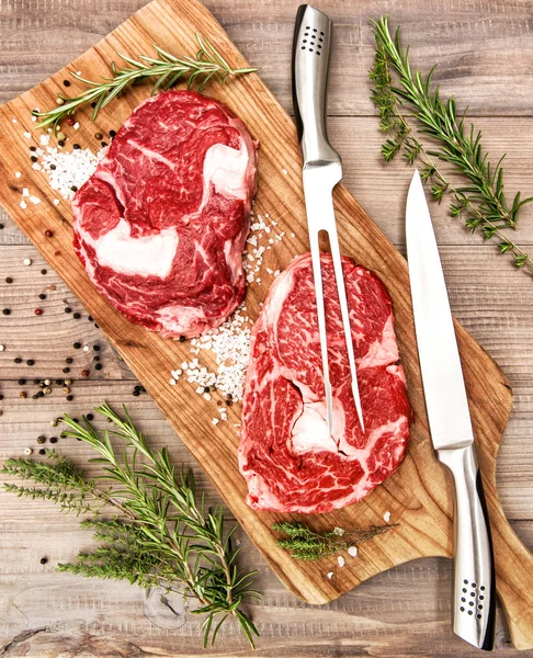 Raw Beef Meat Rib Eye Steak Herbs Spices Wooden Desk — Stock Photo, Image