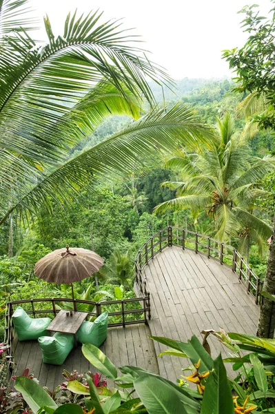 Wooden terrace restaurant tropical landscape palm trees — Stock Photo, Image