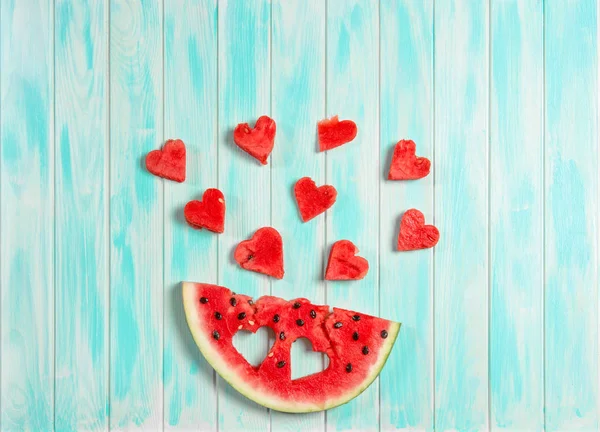 Watermelon hearts blue wooden background Fruits berries — Stock Photo, Image