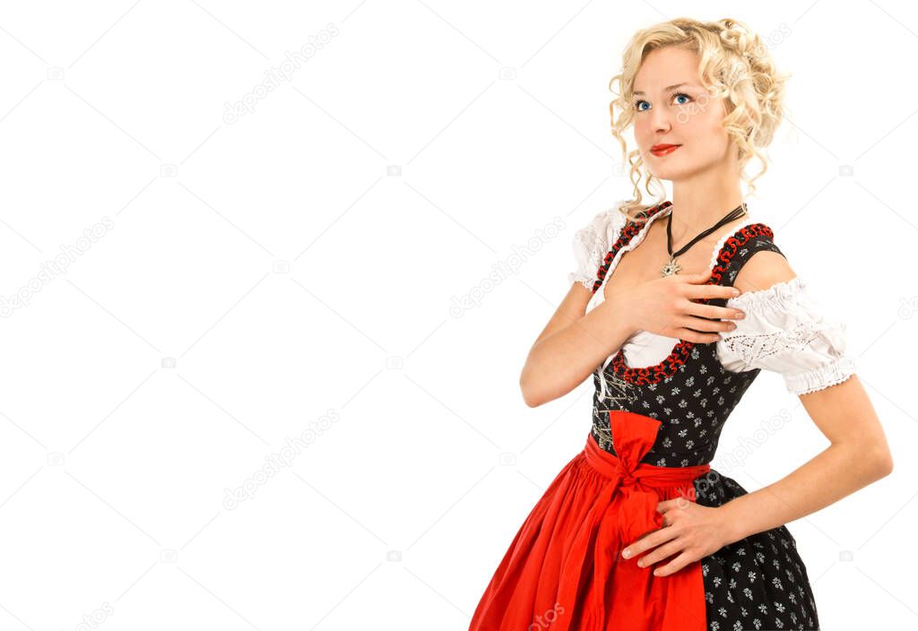 Young german woman in traditional oktoberfest dress dirndl