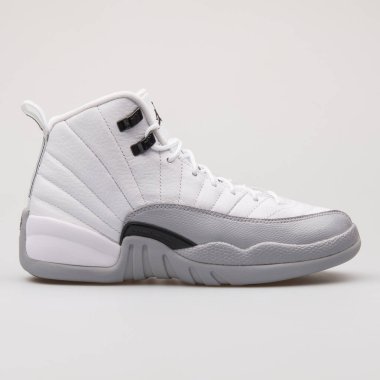 Vienna, Avusturya - 14 Haziran 2017: gri arka plan üzerinde izole Nike Jordan 12 Retro Gg beyaz ve gri spor ayakkabı
