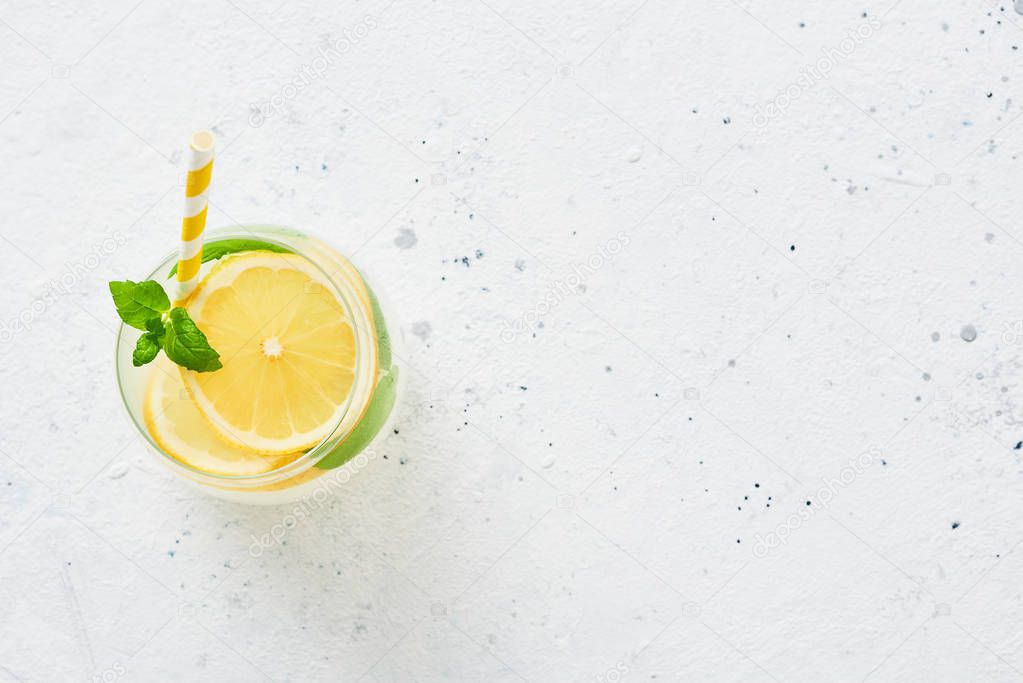 Traditional lemonade or mojito with lemon, mint and ice