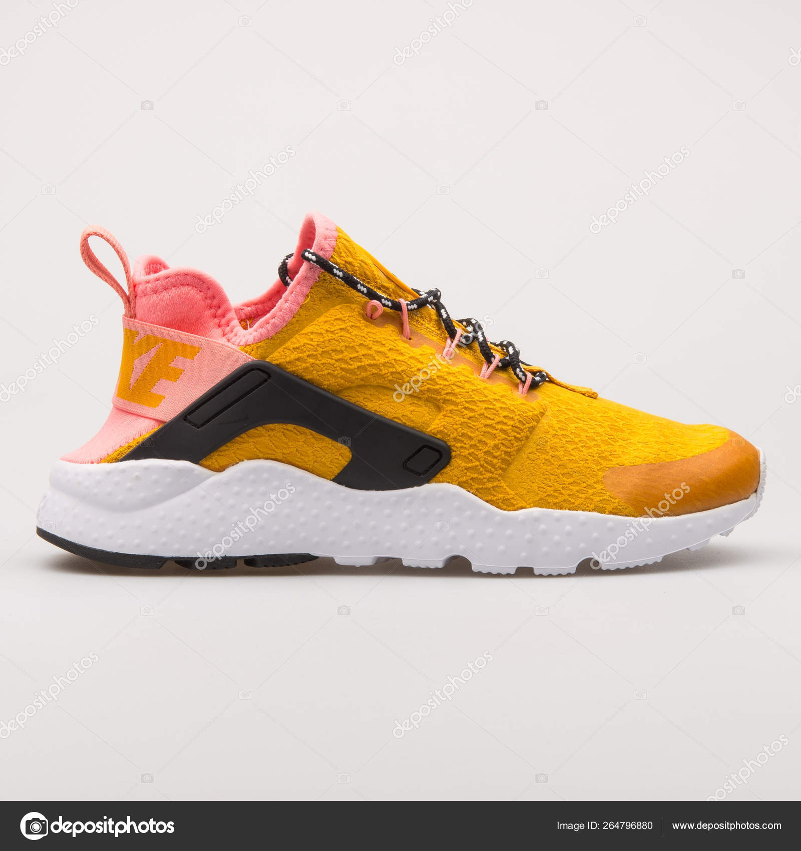 Nike Air Huarache SE gold and pink sneaker – Stock Editorial Photo © xMarshallfilms #264796880