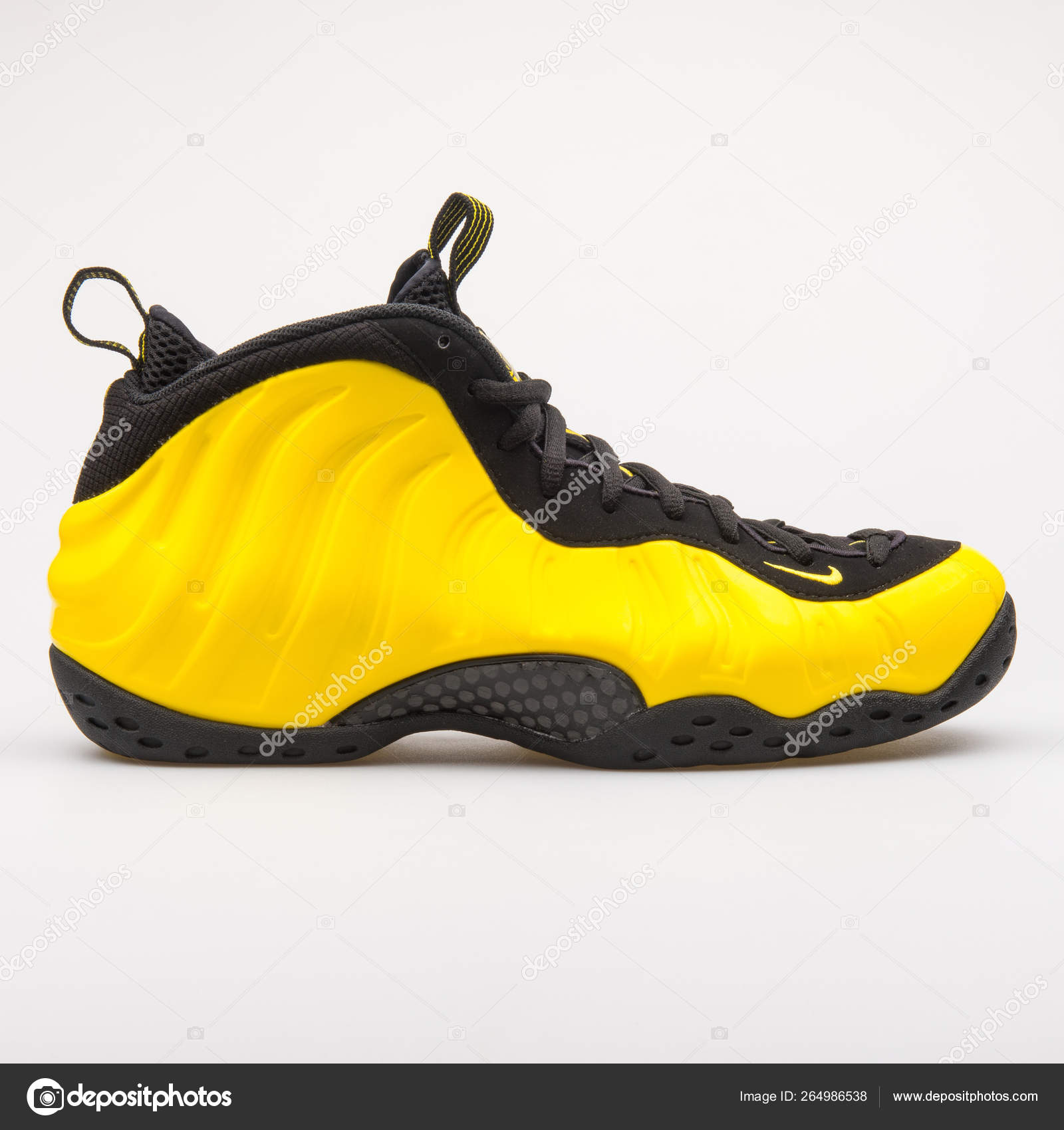 yellow and black gym shoes