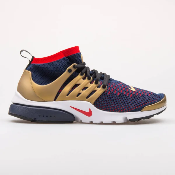 Nike Air Presto Flyknit Ultra blue, red and gold sneaker — Stock Photo, Image