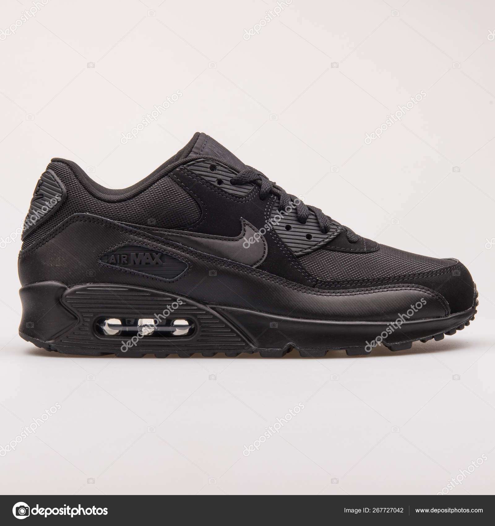 miseria Guiño burlarse de Zapatilla Nike Air Max 90 Essential negro — Foto editorial de stock ©  xMarshallfilms #267727042