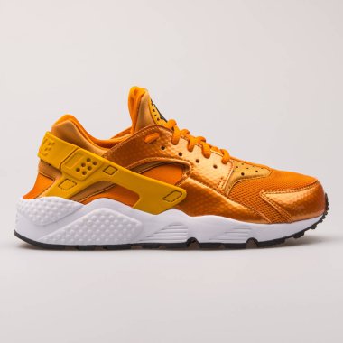 Nike Air Huarache Run altın spor ayakkabı