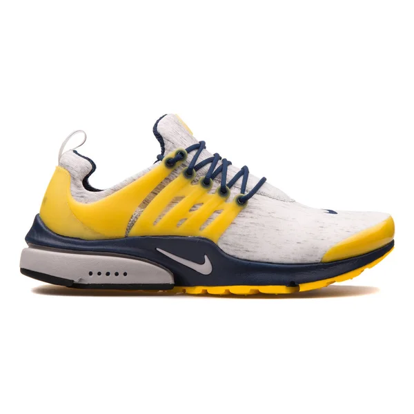 Nike Air Presto grey, navy blue and yellow sneaker — Stock Photo, Image