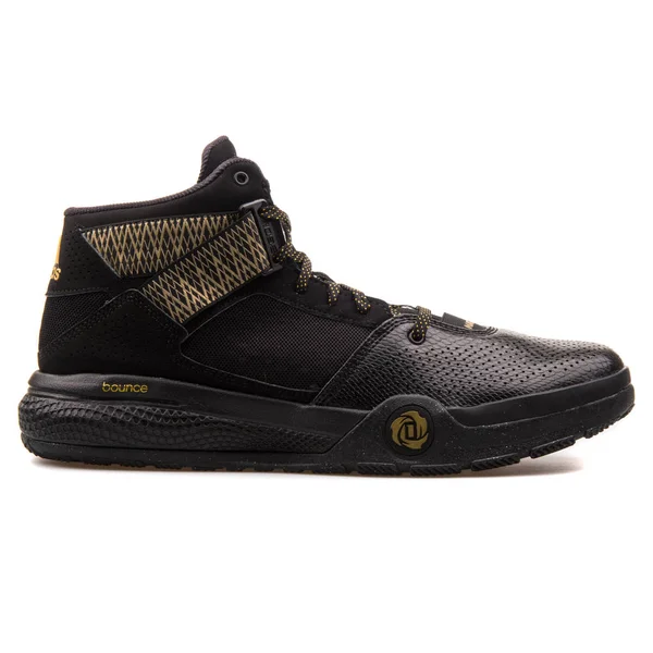 Adidas D Rose 773 IV zwart en goud sneaker — Stockfoto