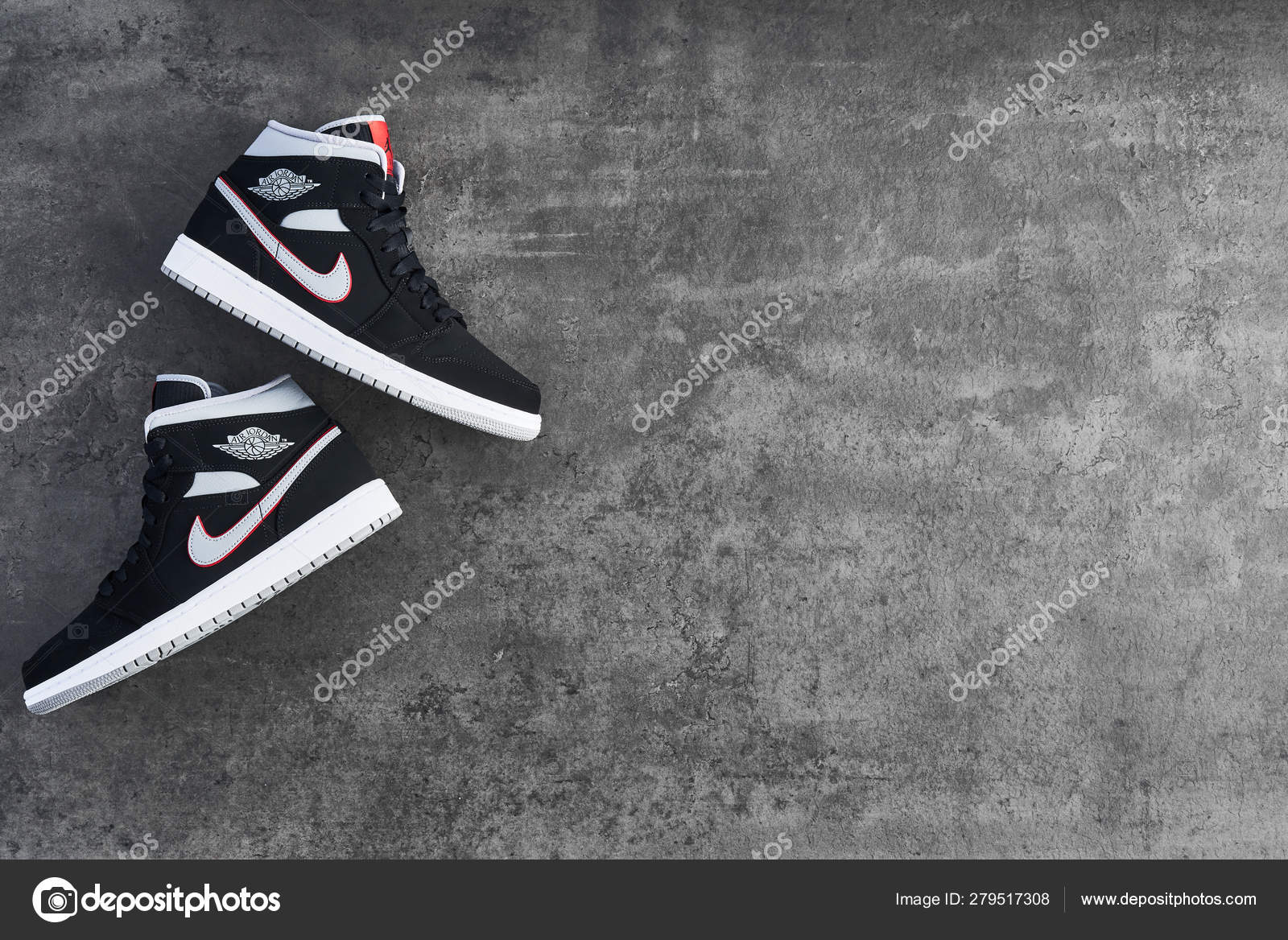 Nike Air Jordan 1 Mid black, grey, red and white sneakers – Stock Editorial  Photo © xMarshallfilms #279517308