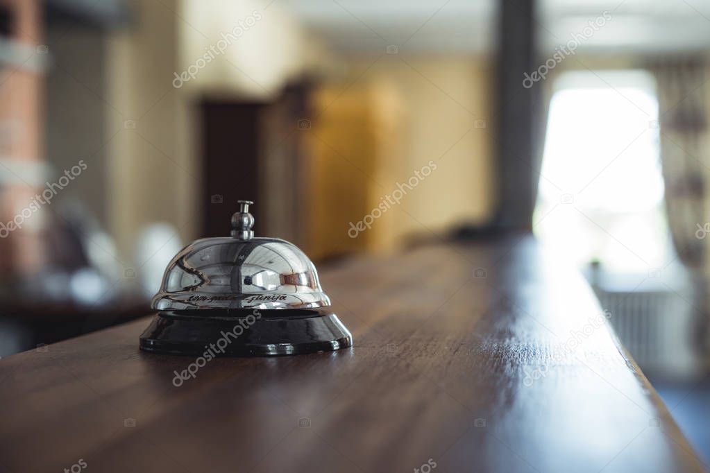 Restaurant Service Bell on the Table in Hotel Reception -  Vintage with Bokeh, Daylight Background - Business Concept