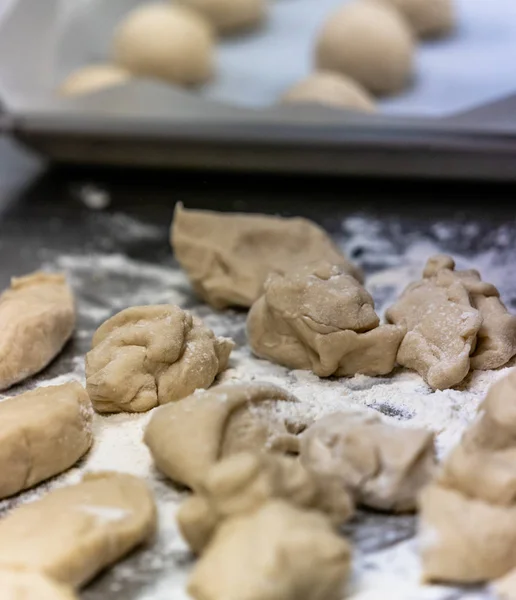 Small Bread Dough Balls Placed on Cooking Paper on Pan - Ready to be Baked, Kitchen Set