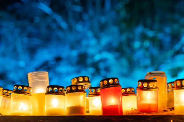 Burning Candles Yellow Red Colors Shallow Depth Field Blue Background — Stock Photo, Image