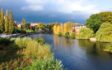 The River Severn passing through Shrewsbury in Shropshire, England clipart