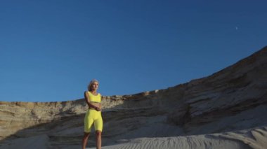 sport blond girl go on the beach