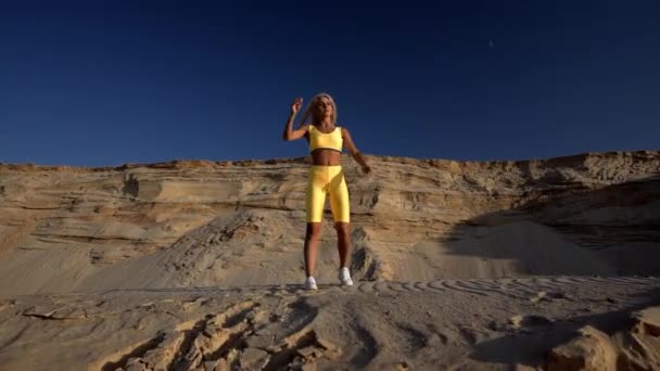 Young Athlete Woman Stretches Beach — Stock Video