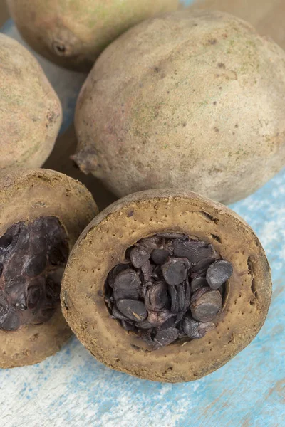 Jenipapo, a fruit from tropical America, used for centuries as a coloring, very appreciated also as raw material for liqueurs, sweets and syrup