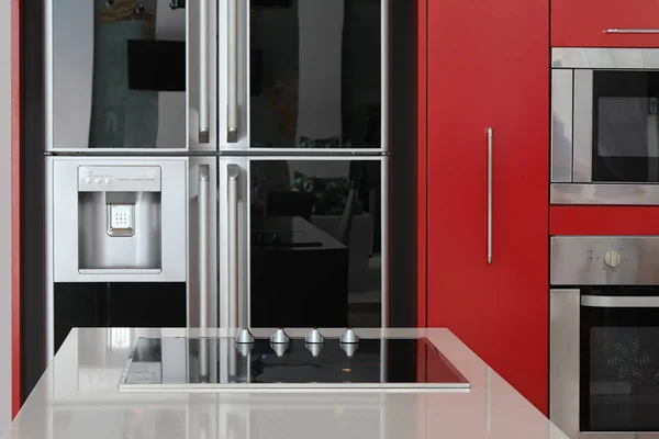 Interior design of modern black and red kitchen
