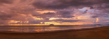 Panoramic view of beautiful sunset over seascape at Khao Lak, Thailand. clipart
