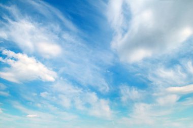 Light clouds in the blue sky.