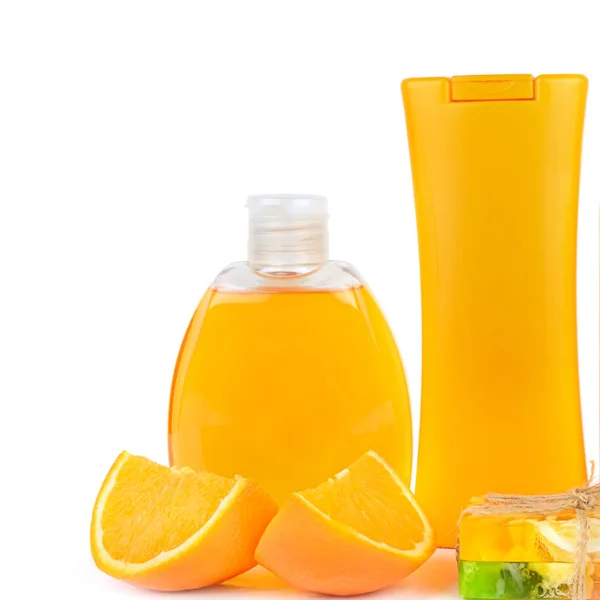 Productos cosméticos naturales de naranja: aceite de bronceado y loción. Viales i — Foto de Stock