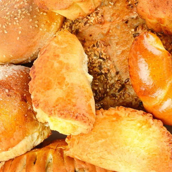 Πολλά Μικτά Ψωμιά Και Ρολά Τραβήχτηκαν Από Ψηλά Φόντο Ζαχαροπλαστικής — Φωτογραφία Αρχείου