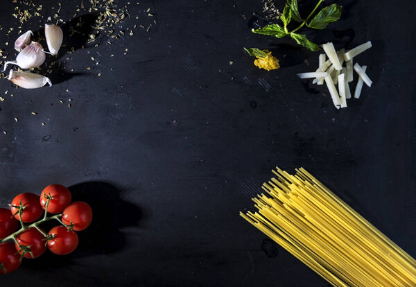 Italian traditional favours  on a black slates, above vantage point, food photography
