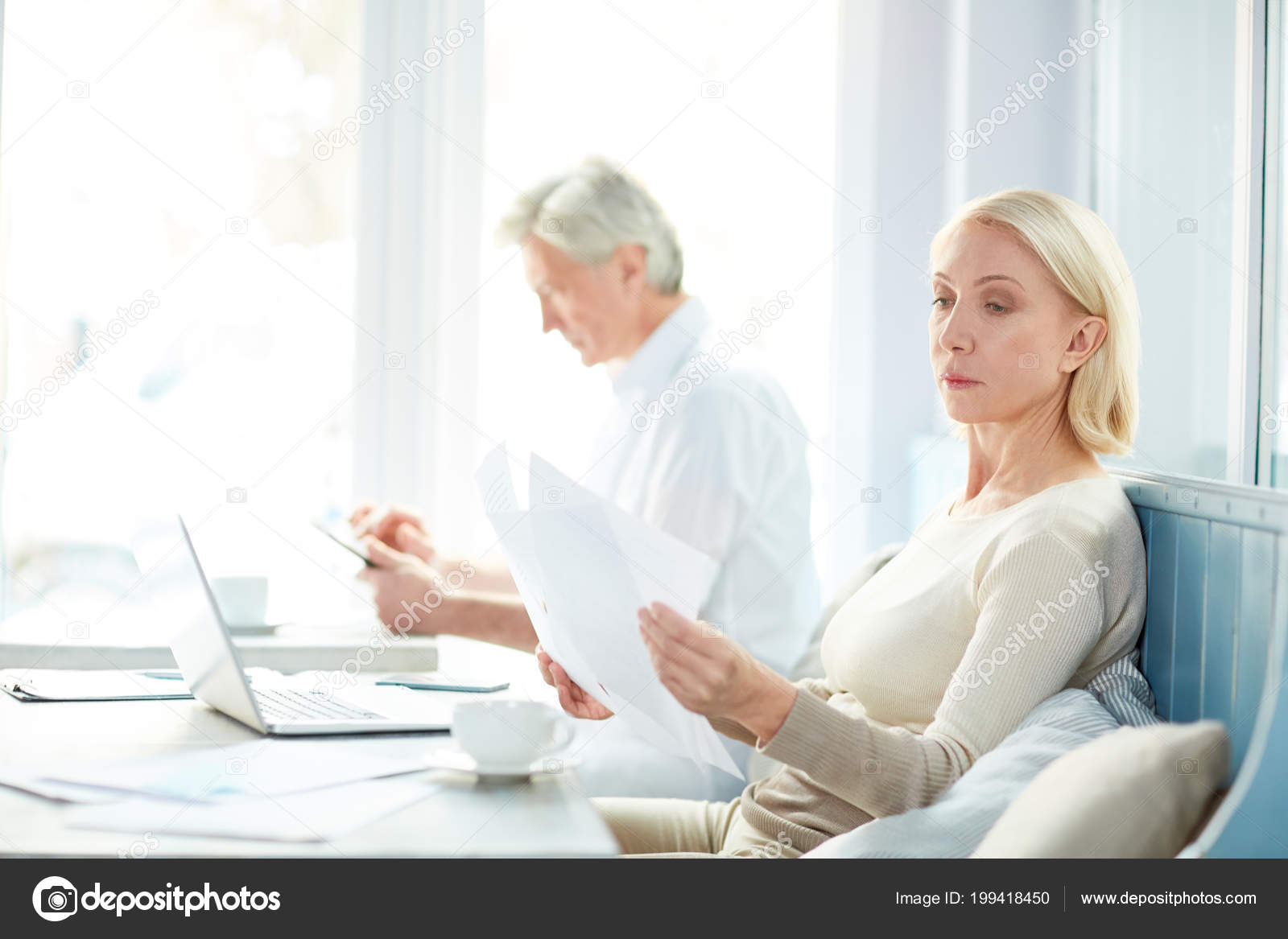 mature woman with colleague Mature woman with colleague