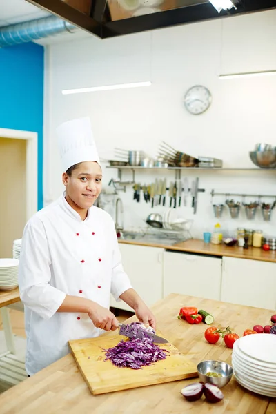 Young Successful Professional Chef Uniform Cutting Fresh Purple Cabbage Salad — Stock Photo, Image