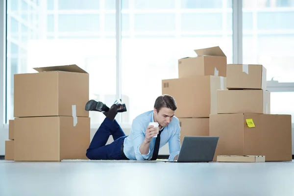 Relaxed Businessman Glass Coffee Lying Floor New Office Laptop Front — Stock Photo, Image