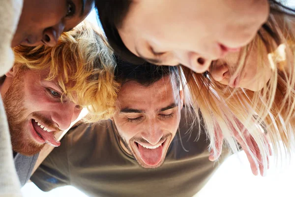 Funny Fuys Grimacing Looking While Embracing Friends — Stock Photo, Image