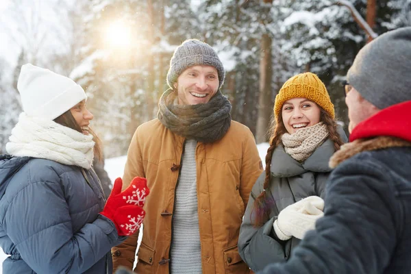 Group Young Cheerful Friends Winterwear Having Talk Snowy Day Forest — Stock Photo, Image