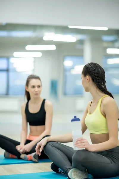 Two Active Women Sitting Mats Break Sports Training Talking Having — Stock Photo, Image