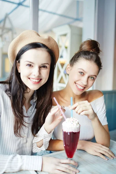 Two Pretty Girls Sharing Yummy Cocktail While Enjoying Time Cafe — Stock Photo, Image