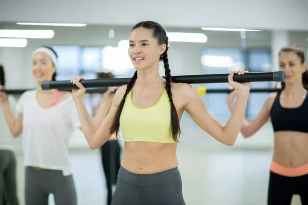 Young Active Woman Her Groupmates Gymnastic Bars Shoulders Exercising Fitness — Stock Photo, Image