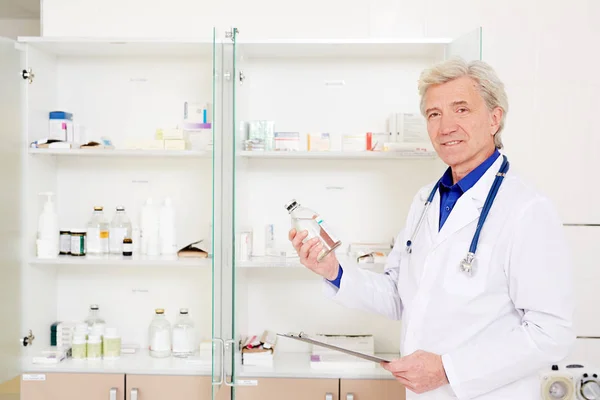 Mature Doctor Working Medicines List — Stock Photo, Image