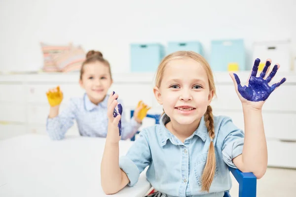 Adorable Child Her Palms Blue Paint Looking Camera Lesson Kindergarten — Stock Photo, Image