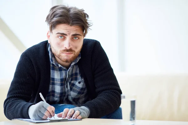 Dirty Homeless Man Looking Camera While Filling Papers Center Social — Stock Photo, Image