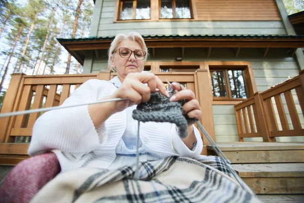 Serious Concentrated Attractive Grandmother Glasses Sitting Porch Holiday House Knitting — Stock Photo, Image