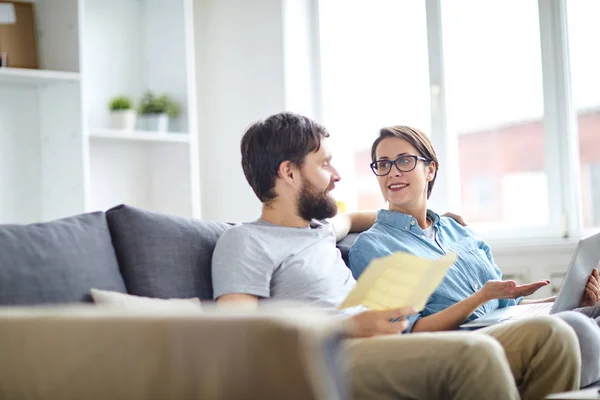 Affectionate Couple Relaxing Sofa Discussing Online Tours While Looking Best — Stock Photo, Image