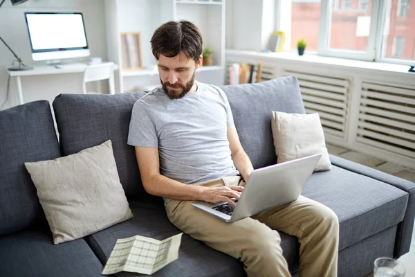 Young Accountant Looking Financial Data Paper Wnd Entering Laptop While — ストック写真