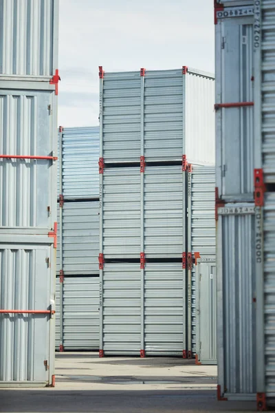 Stacks of new storage containers that can be used for storing cargo and other things or supplies