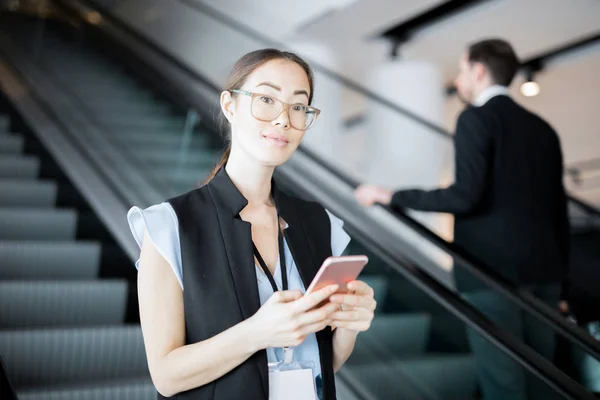 Young Contemporary Employee Smartphone Looking You While Texting Escalator — 스톡 사진